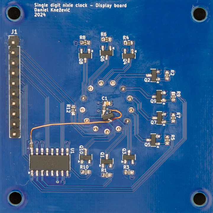Botched nixie clock display board PCB with added level shifter for the RGB LED